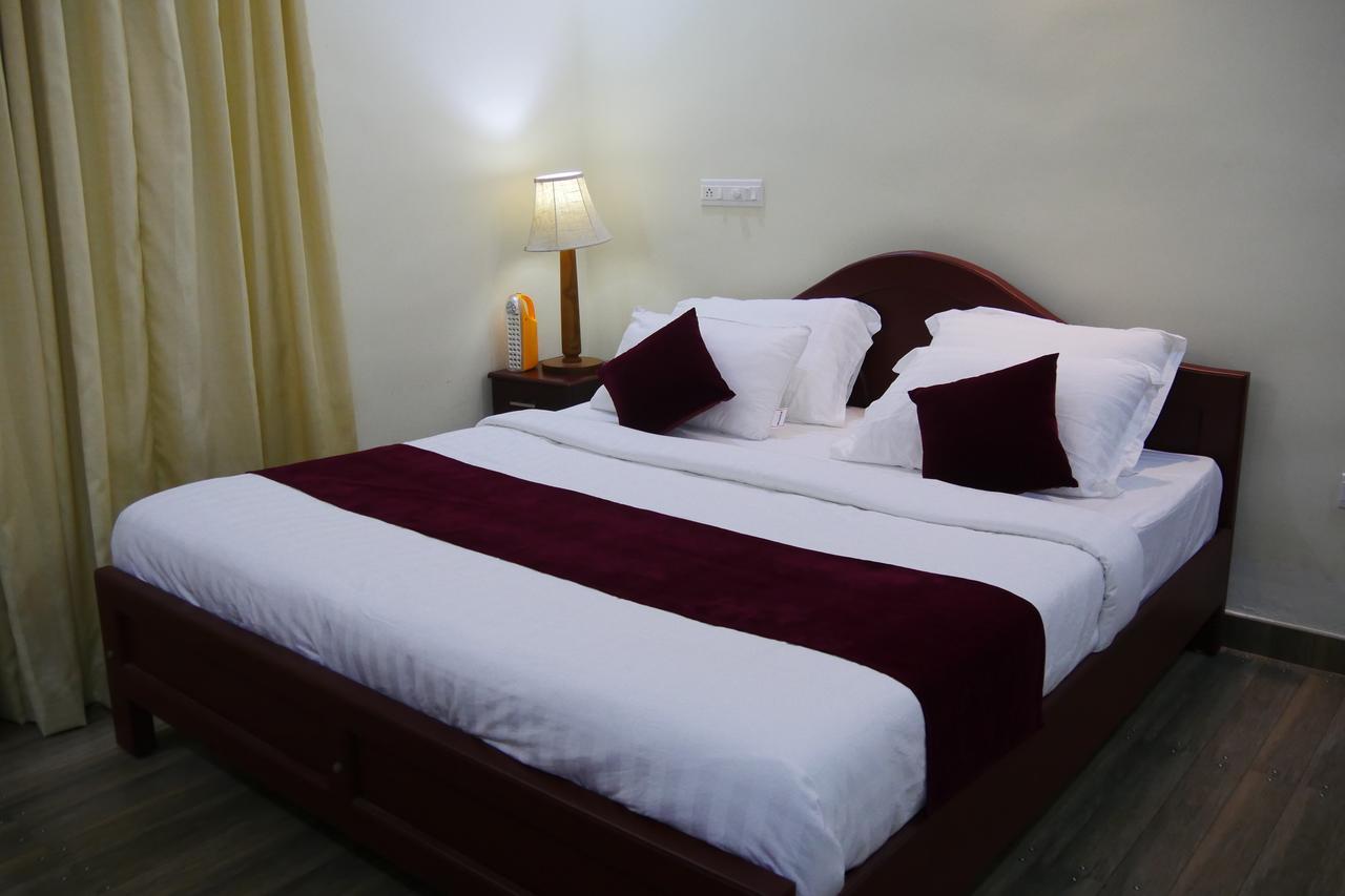Mango Meadows Hotel Kottayam Bagian luar foto