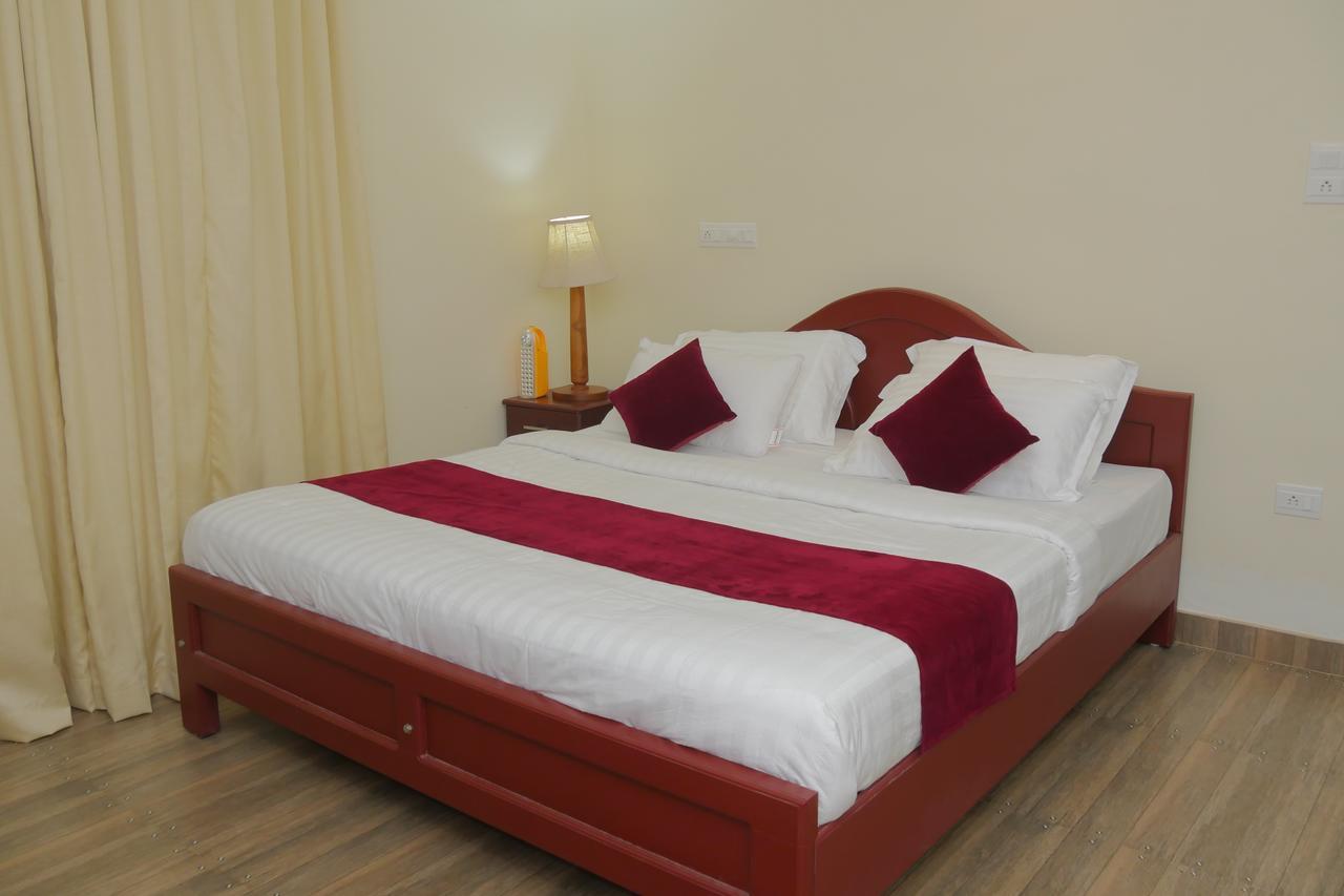 Mango Meadows Hotel Kottayam Bagian luar foto