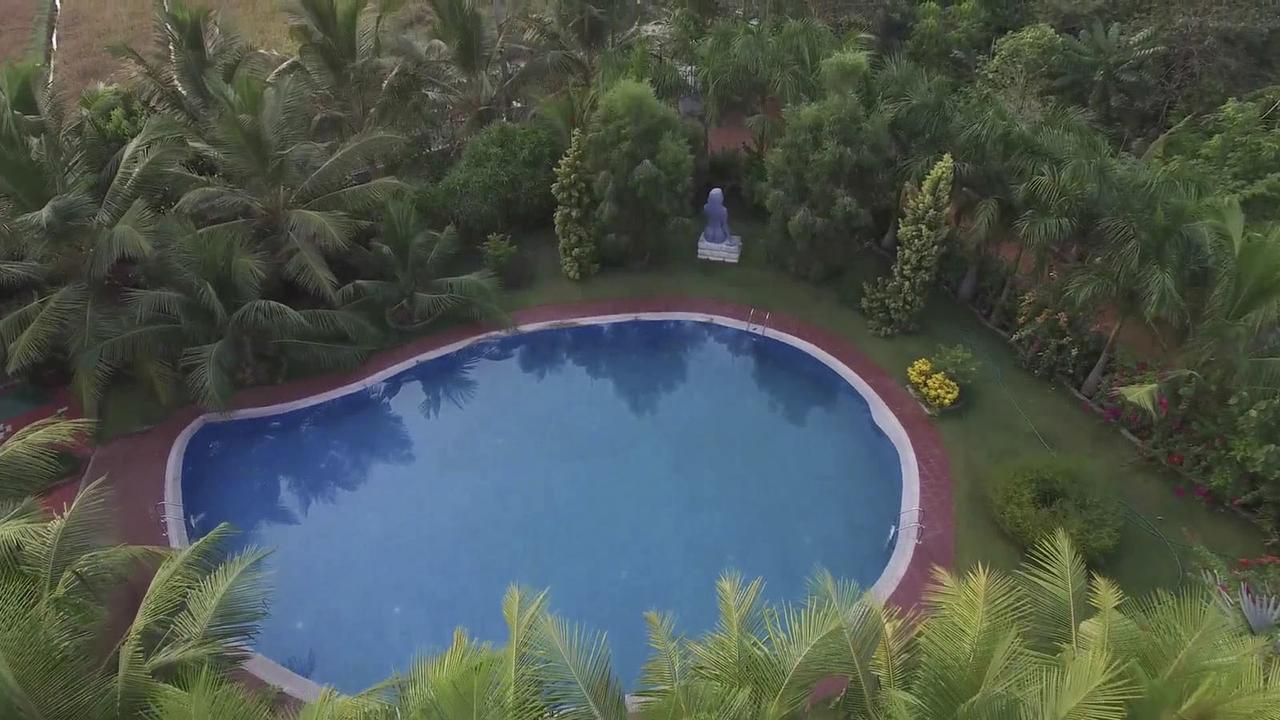 Mango Meadows Hotel Kottayam Bagian luar foto