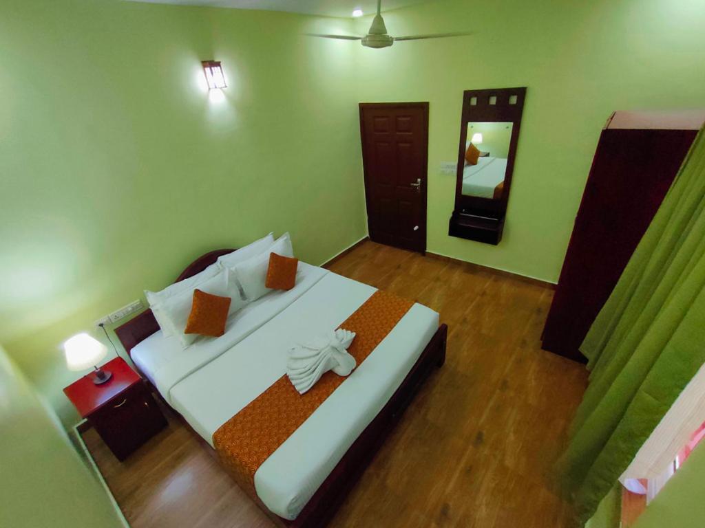 Mango Meadows Hotel Kottayam Bagian luar foto