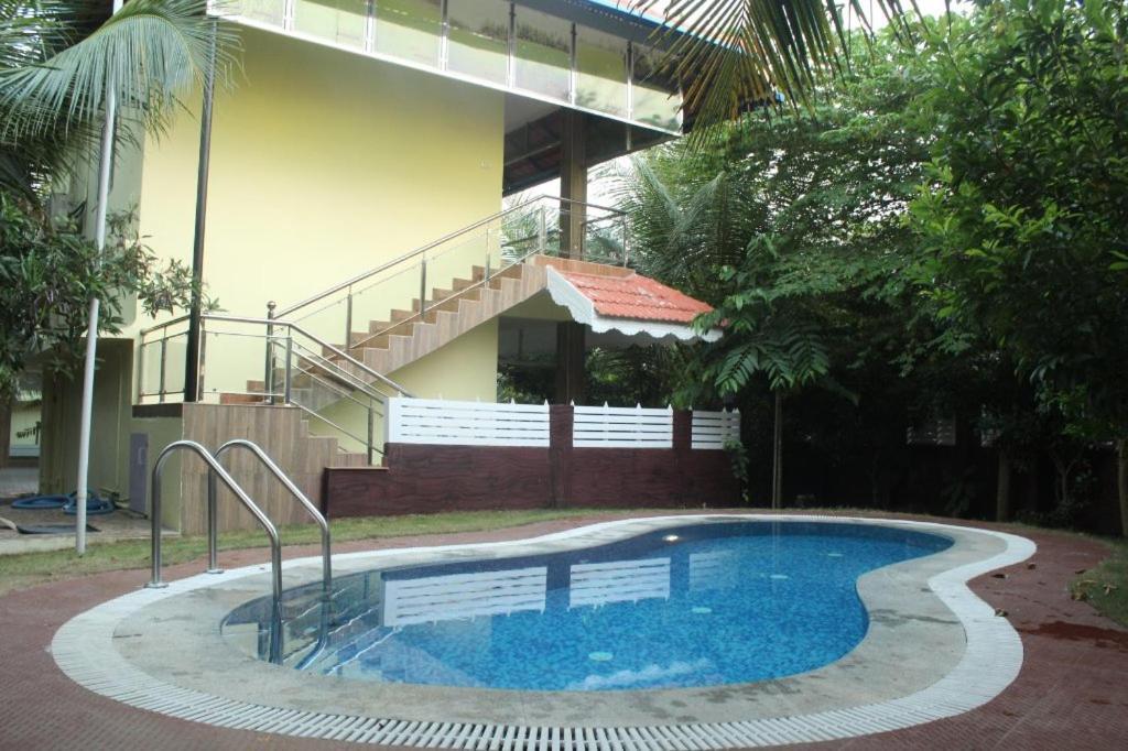 Mango Meadows Hotel Kottayam Bagian luar foto