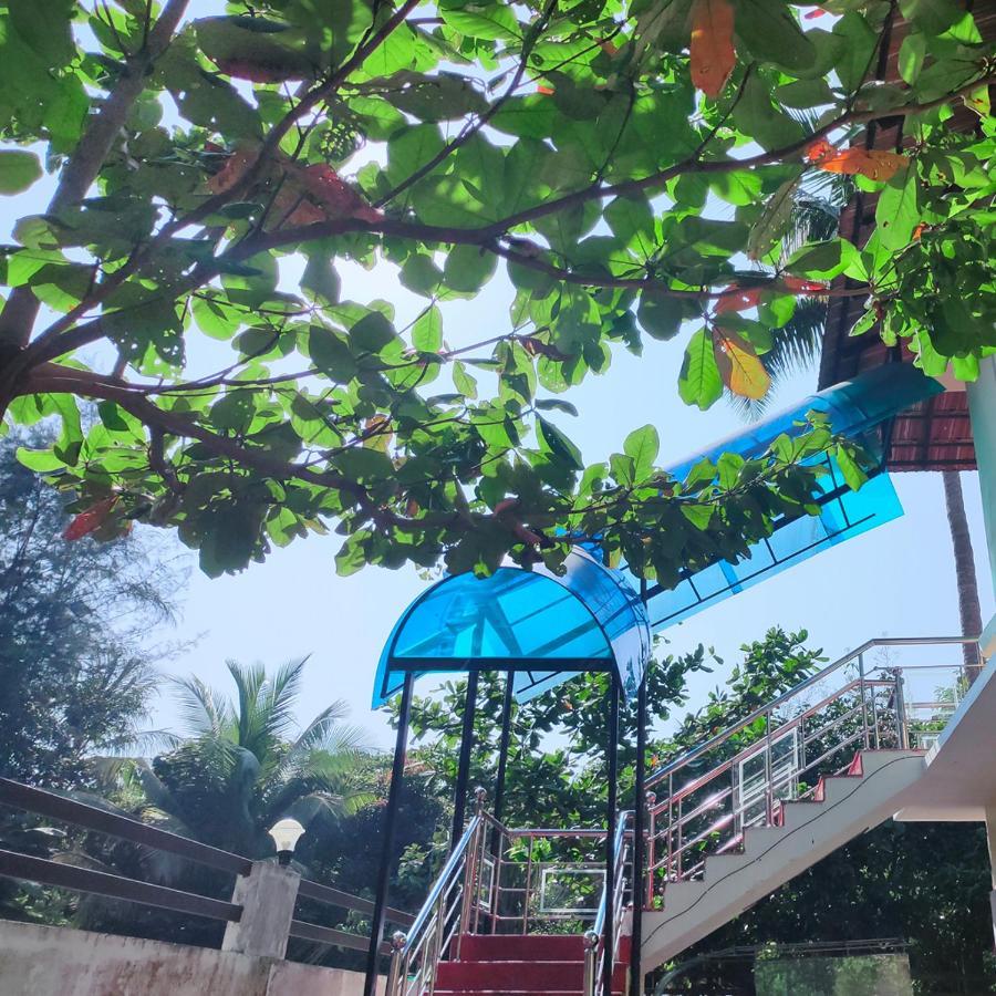 Mango Meadows Hotel Kottayam Bagian luar foto